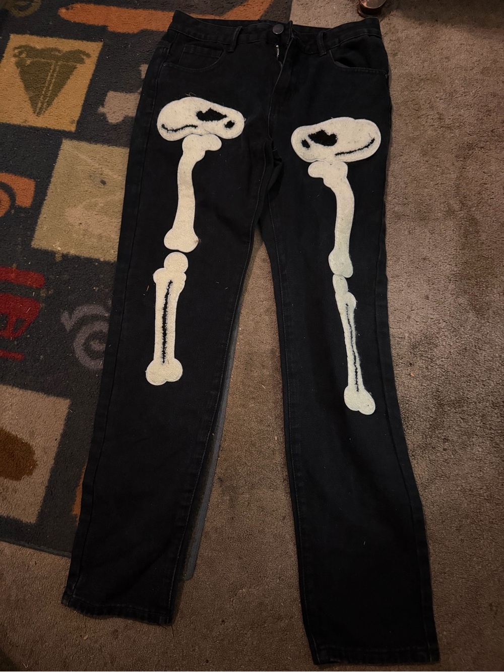 Classic Black Skinny Jeans with White Skeleton Leg Graphics